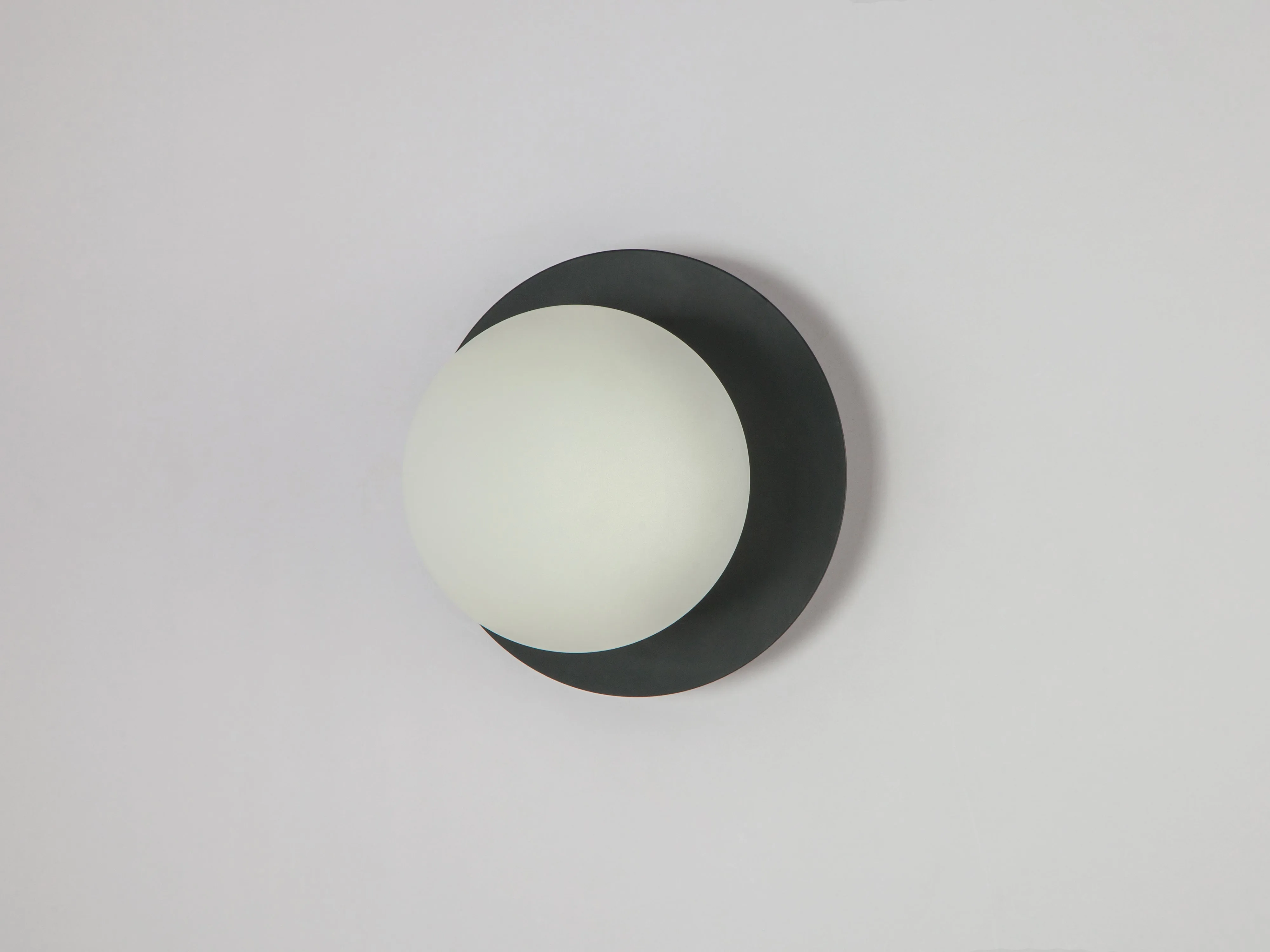 Charcoal grey opal disk wall light