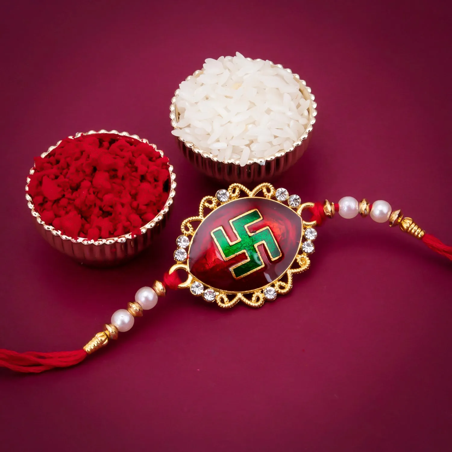 Sukkhi Blossomy Gold Plated Swastik Meenakari Rakhi with Roli Chawal and Raksha Bandhan Greeting Card For Men