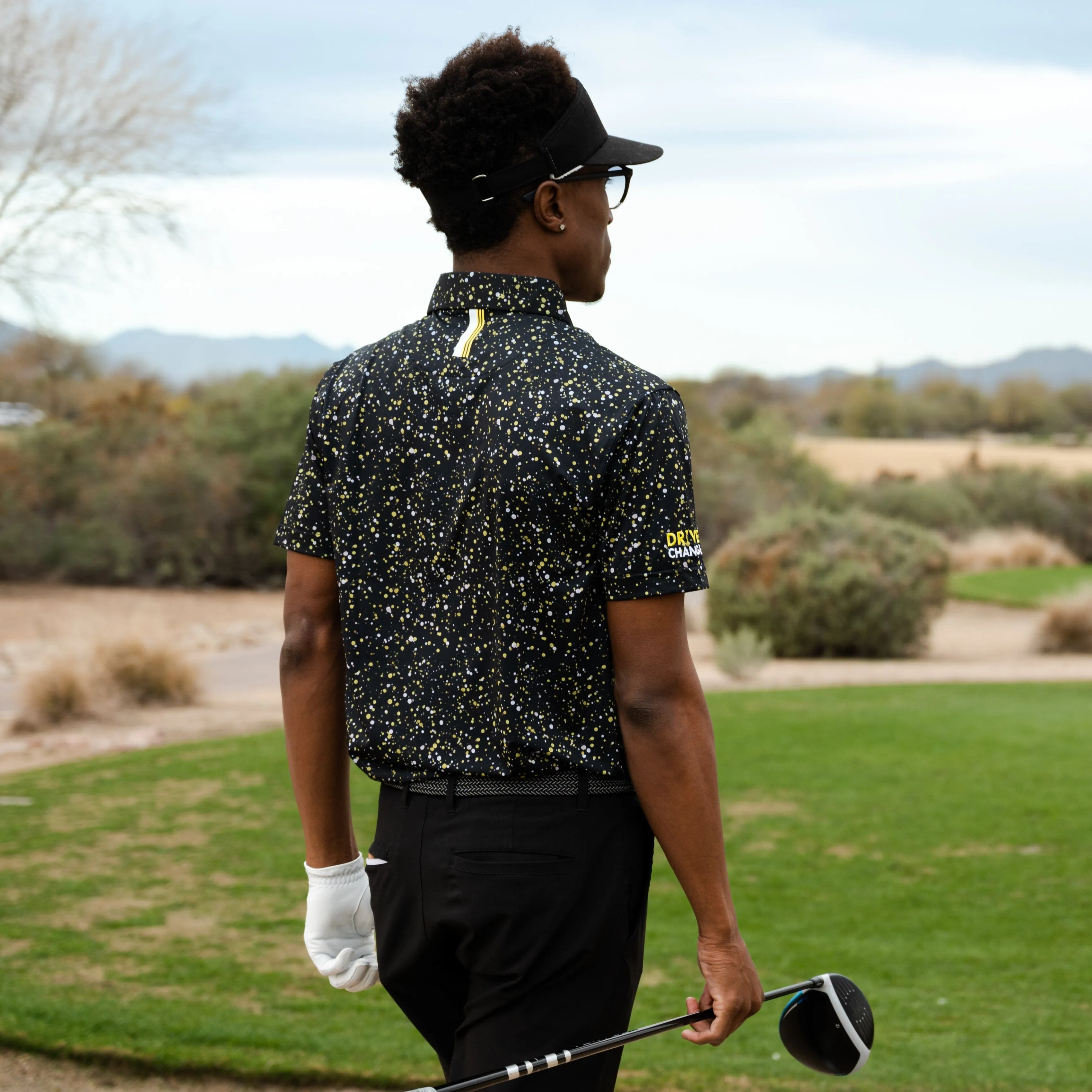 The Bootleg Splatter | Performance Polo | The Bootleg Splatter - Black/Sun Yellow - Drive Change